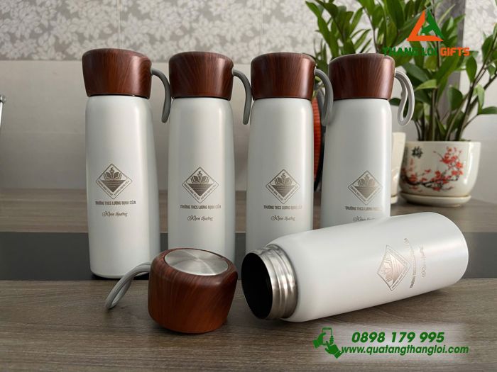 Bình Giữ Nhiệt Màu Trắng Nắp Vân Gỗ - Khắc Logo THCS Lương Định Của