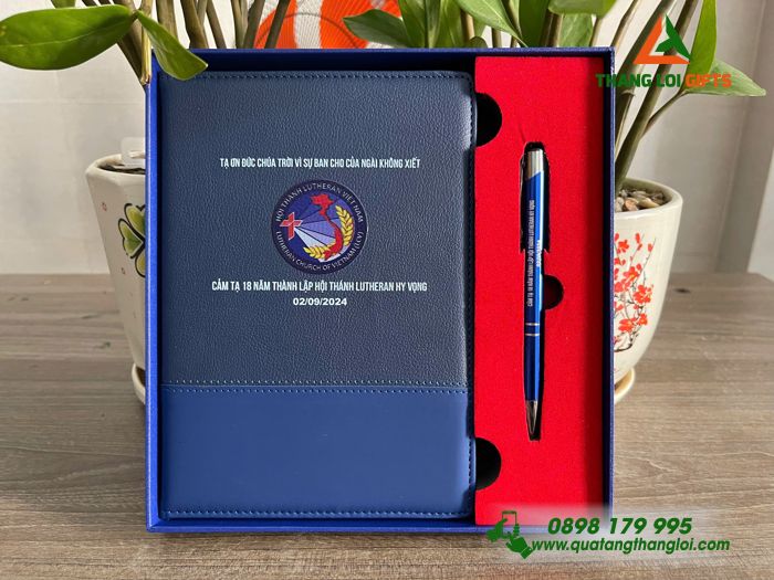 Combo Quà Tặng (Sổ Tay Dán Gáy & Bút Bi) Màu Xanh - In Khắc Logo Hội Thánh Lutheran Việt Nam