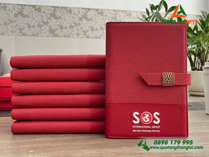 Sổ Tay Bìa Còng Màu Đỏ - In Logo Doanh Nghiệp SOS International Group