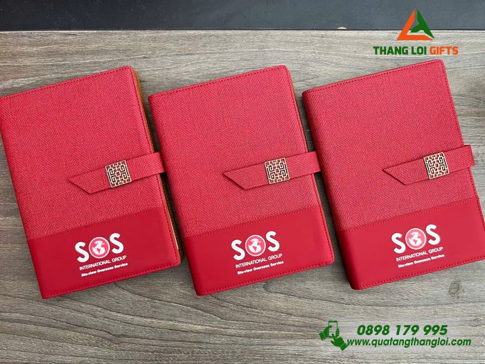Sổ Tay Bìa Còng Màu Đỏ - In Logo Doanh Nghiệp SOS International Group