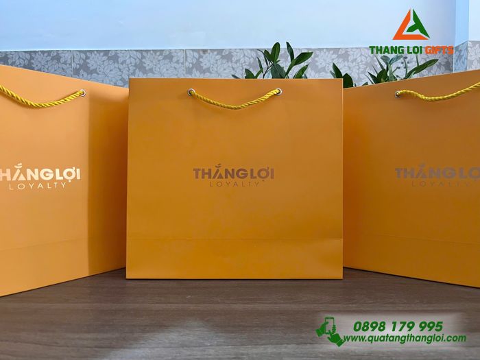 Túi Xách Giấy Ivory Màu Vàng - Ép Kim Logo Doanh Nghiệp Thắng Lợi Loyalty