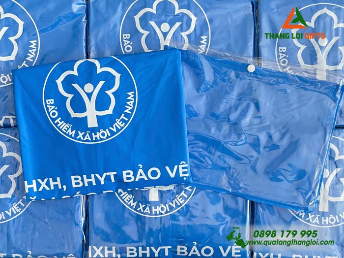 Áo Mưa Vải Rạng Đông Màu Xanh - In Logo Bảo Hiểm Xã Hội Việt Nam