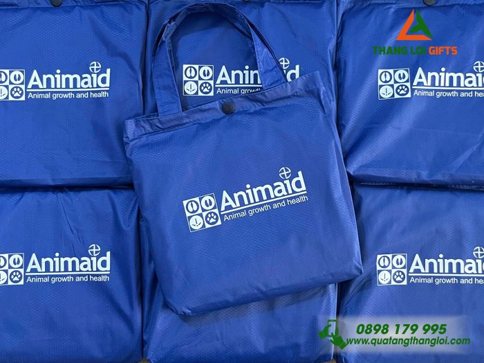 Áo Mưa Cánh Dơi Màu Xanh Vảo Tổ Ong In Logo Doanh Nghiệp Animaid