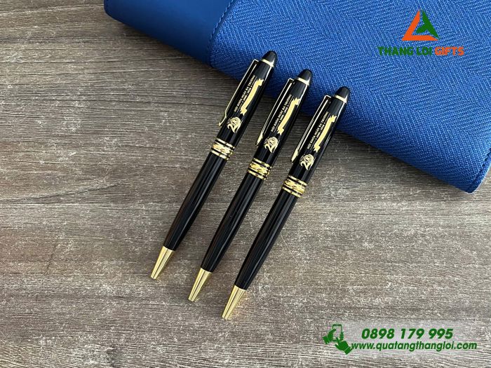 Bút Ký Kim Loại Xoay Màu Đen Khoen Vàng Khắc Logo Kỷ Niệm 20 Năm Ngày Trở Về Trường THPT Trần Hưng Đạo