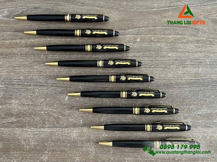 Bút Ký Kim Loại Xoay Màu Đen Khoen Vàng Khắc Logo Kỷ Niệm 20 Năm Ngày Trở Về Trường THPT Trần Hưng Đạo