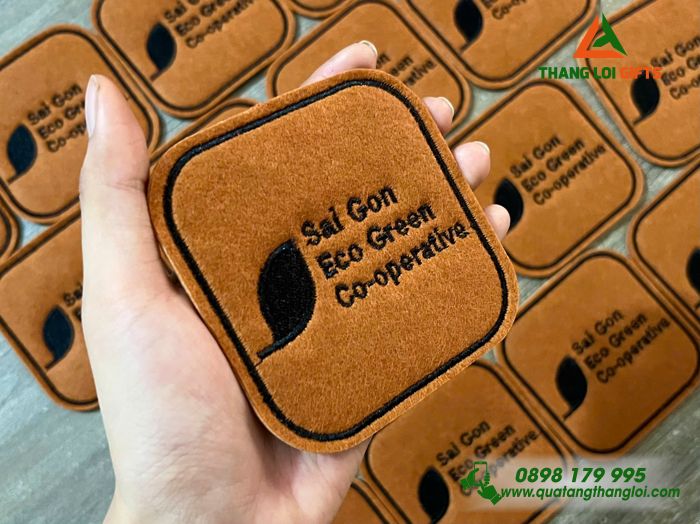 Miếng Lót Ly Màu Nâu Thêu Logo Doanh Nghiệp Sai Gon Eco Green Co-operative