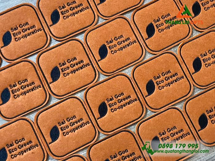 Miếng Lót Ly Màu Nâu Thêu Logo Doanh Nghiệp Sai Gon Eco Green Co-operative