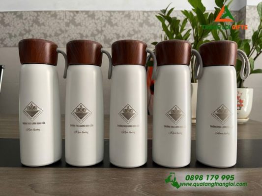 Bình Giữ Nhiệt Màu Trắng Nắp Vân Gỗ - Khắc Logo THCS Lương Định Của